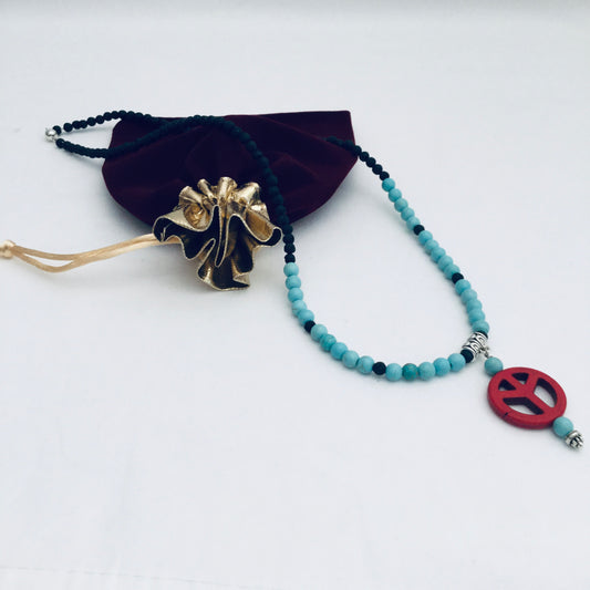 Ease Rocks Turquoise + Black Lava Necklace Enhanced With Red Peace Pendant